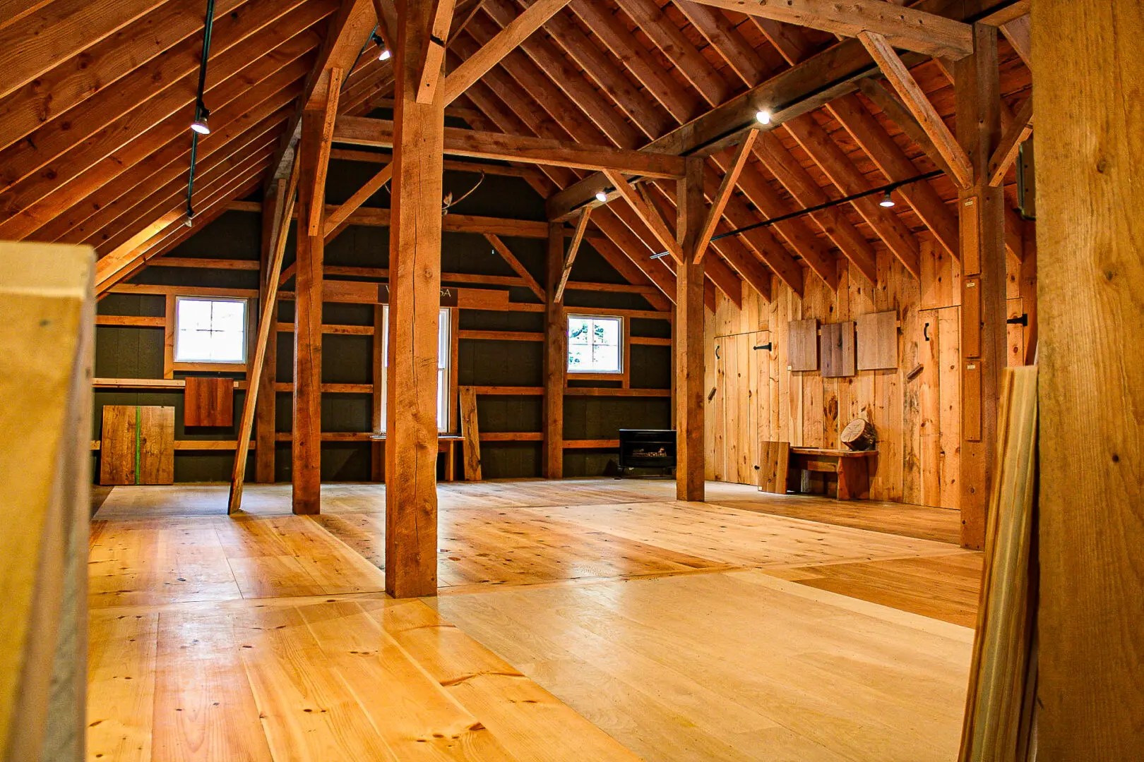 A large room with wooden floors and walls.