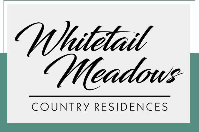 A picture of the logo for whitetail meadow country residences.